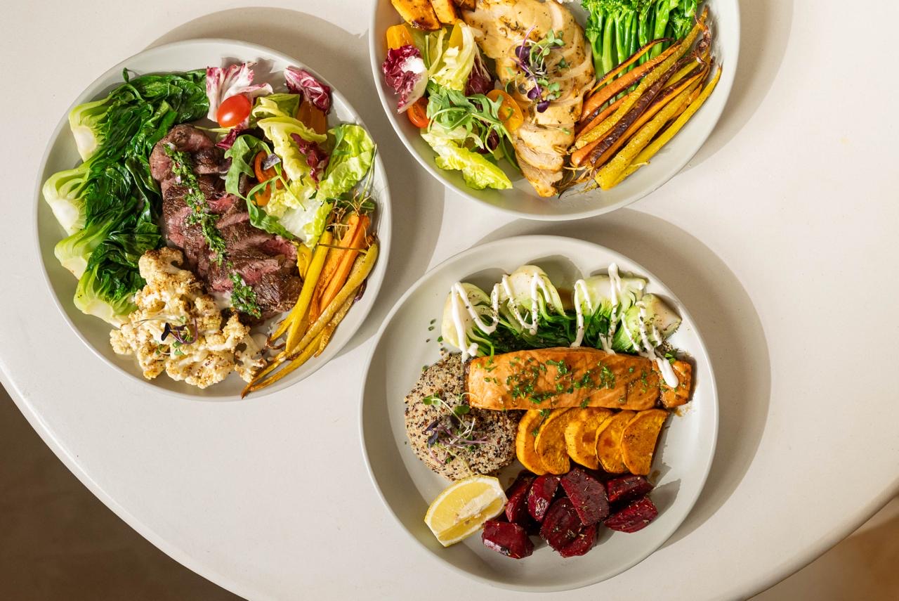 TDK plates with balanced meals and fresh vegetables